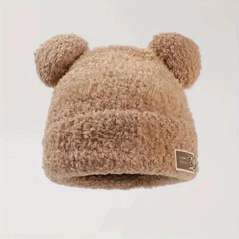 The light brown beanie with its soft and warm tone keeps you warm and makes you stand out with your elegance.