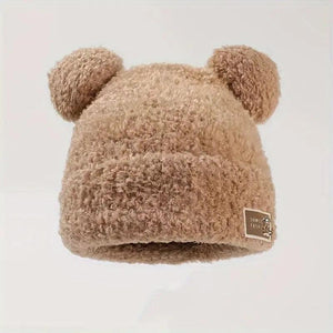 The light brown beanie with its soft and warm tone keeps you warm and makes you stand out with your elegance.